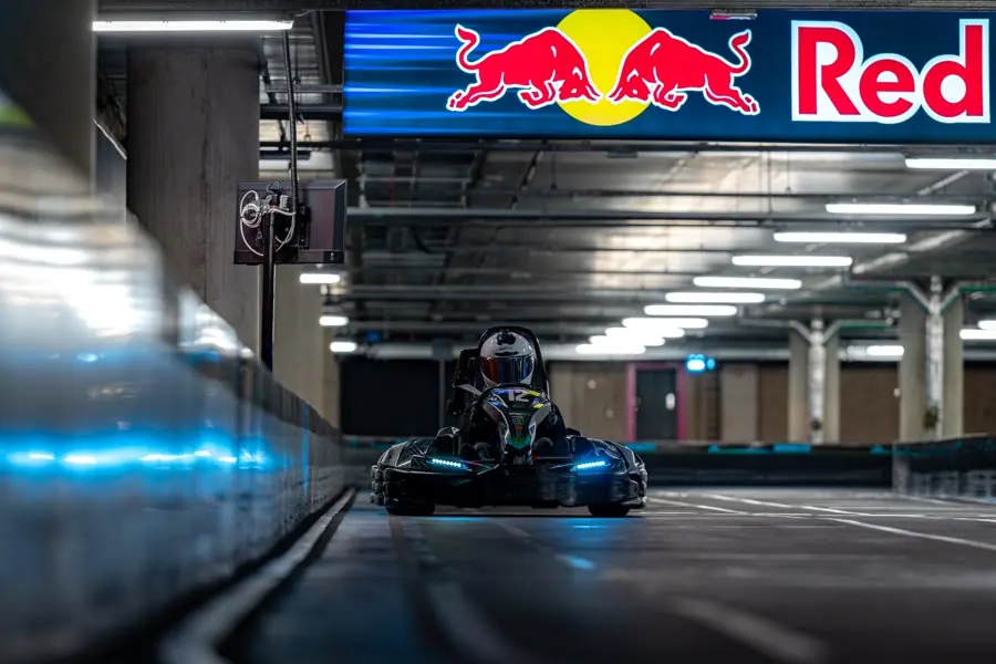 A racer under the Red Bull gantry